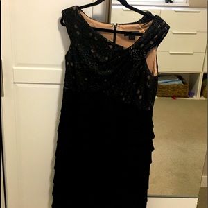 Just in time for the holiday season! Sequin bodice. Layered black skirt size 14